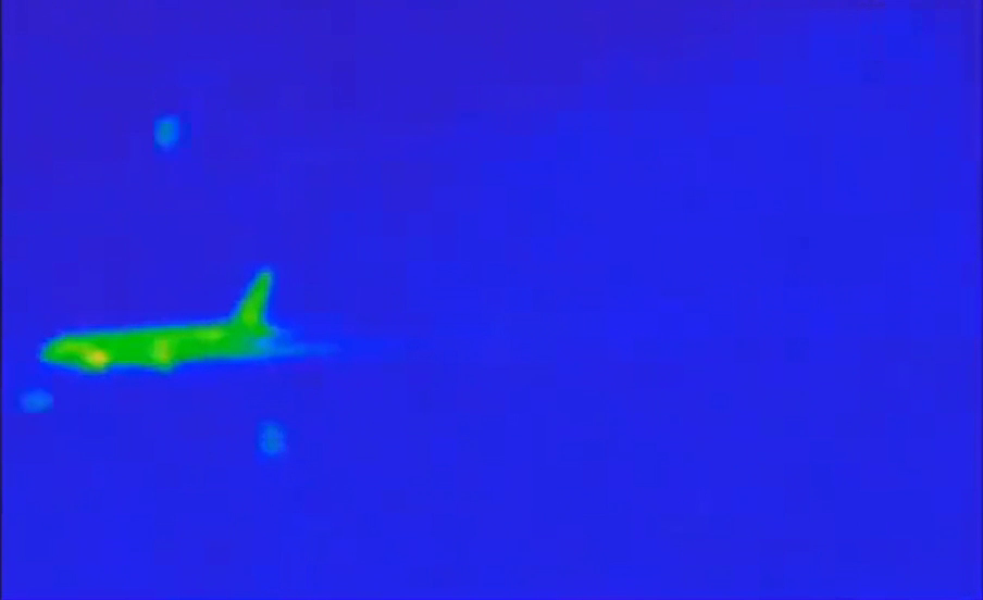 Drone still showing tight pre-event geometry before the flash